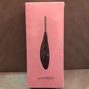 Heated eye lash curler